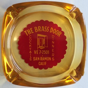 "At the SRV museum yesterday I found this Brass Door ash tray in the archives, not sure of the vintage but the phone number "VE7 2501" (which is still the correct number today!) dates it pretty far back. Smoking was very much the norm when I was growing up in the 50's, 60's and beyond and most restaurants/hotels/etchad their logos on their ash trays." Mark Harrigan
